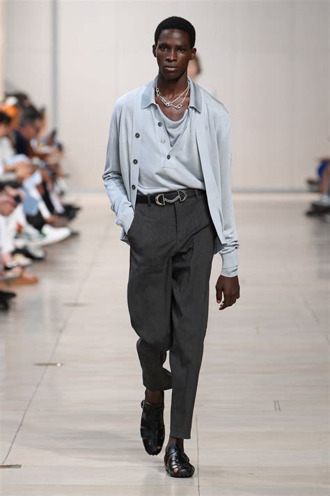 HERMÈS Men Trousers .